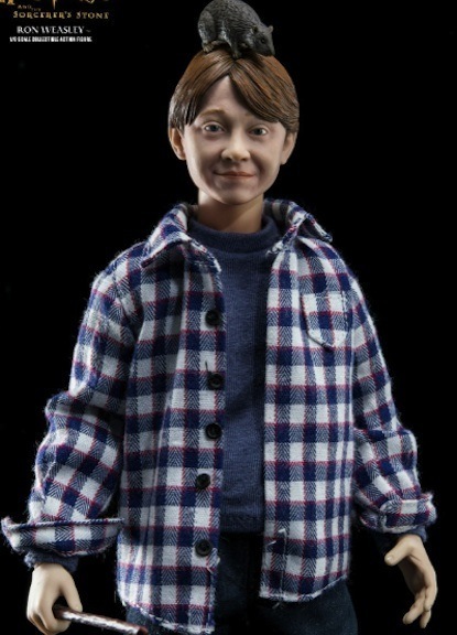 Star Ace has the kids clad in Christmas togs and in casual wear. Here, Ron bonds with his pet rat, Scabbers. Photo courtesy of Star Ace Toys