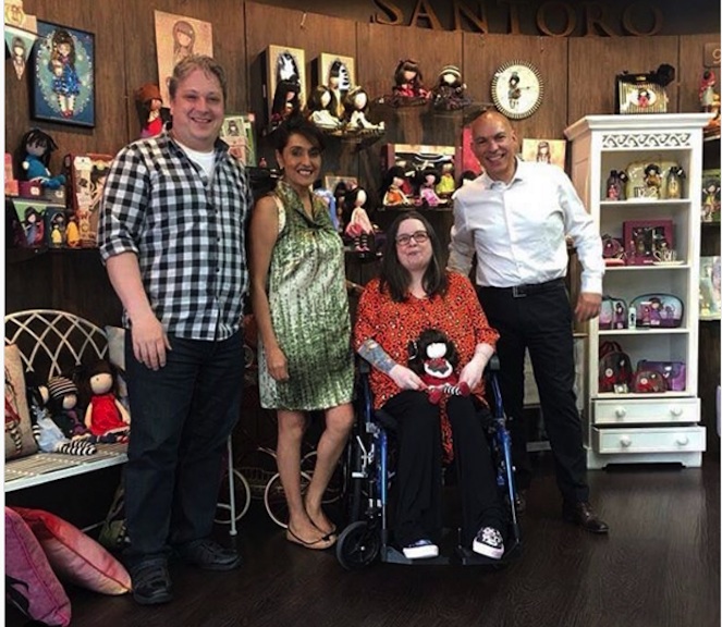 The Santoro team welcomed Grant, extreme left, and Suzanne, holding doll, to their London offices. The photo was posted on Santoro’s Instagram account.
