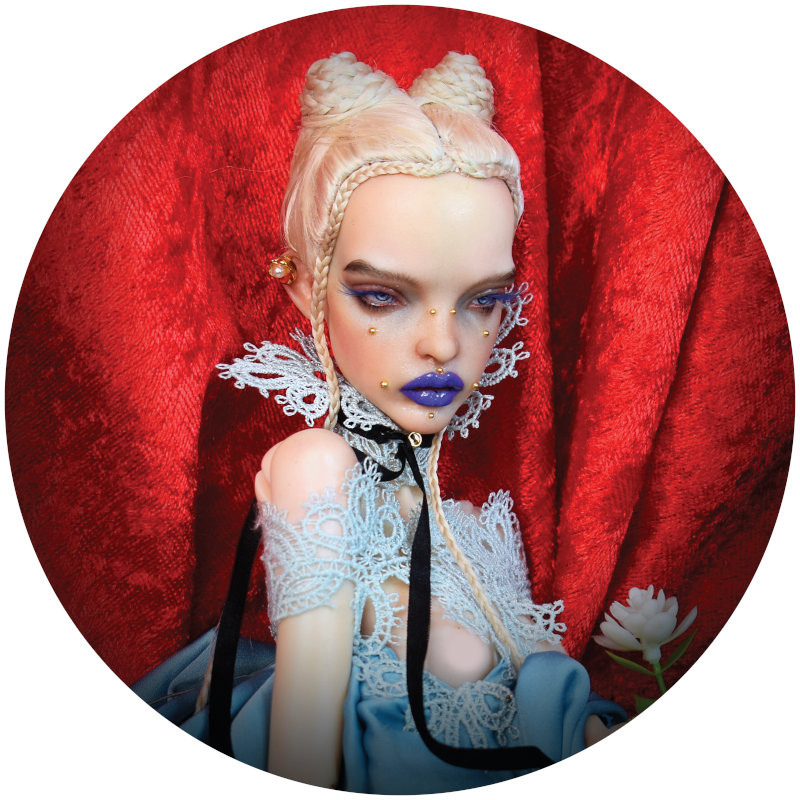 Alice Readies for Her Party: Alice’s Birthday, a PashaPasha Mini using the Sanity face sculpt and White Bone resin.