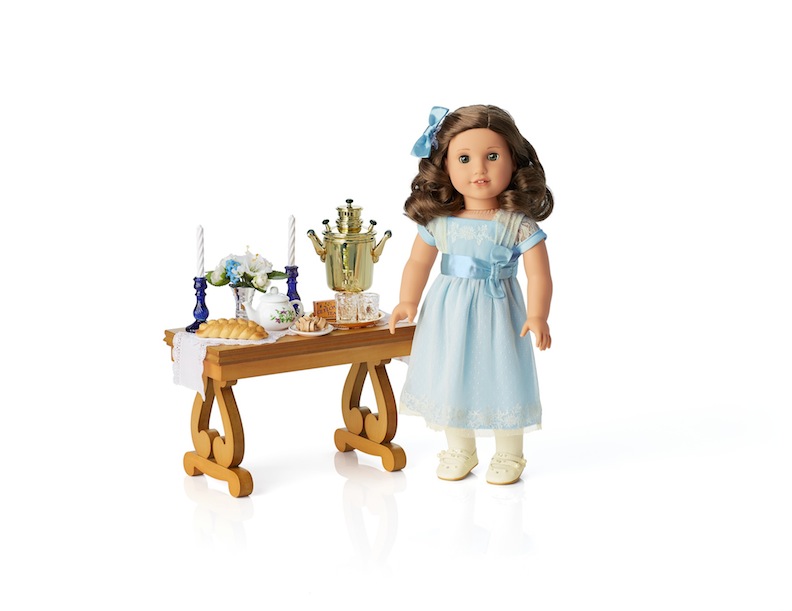 Scaled for 18-inch dolls, American Girl’s Rebecca’s Sabbath Set and Parlor Table are lovely possibilities for a Hanukkah gift exchange.