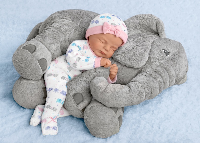Ashton-Drake’s Elle & Peanut are cute confidants. The doll-and-stuffed-toy duo commemorates the special connection between babies and their toys.