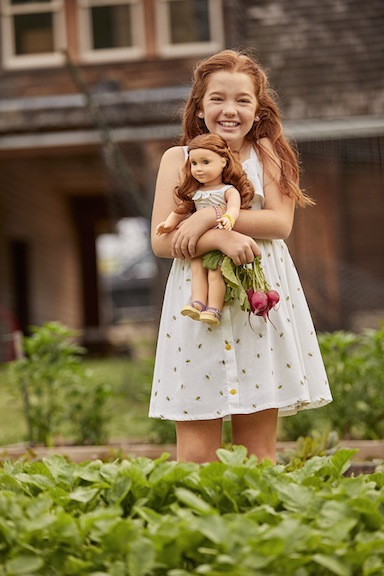 Young girl and Blaire Girl of the Year doll