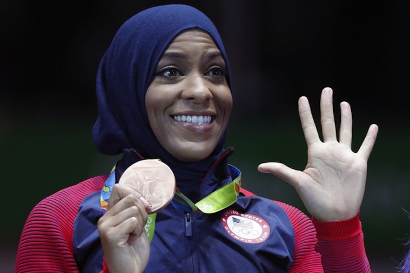 In Rio 2016, making history and receiving her team bronze medal. Photo courtesy Ibtihaj Muhammad Twitter Account