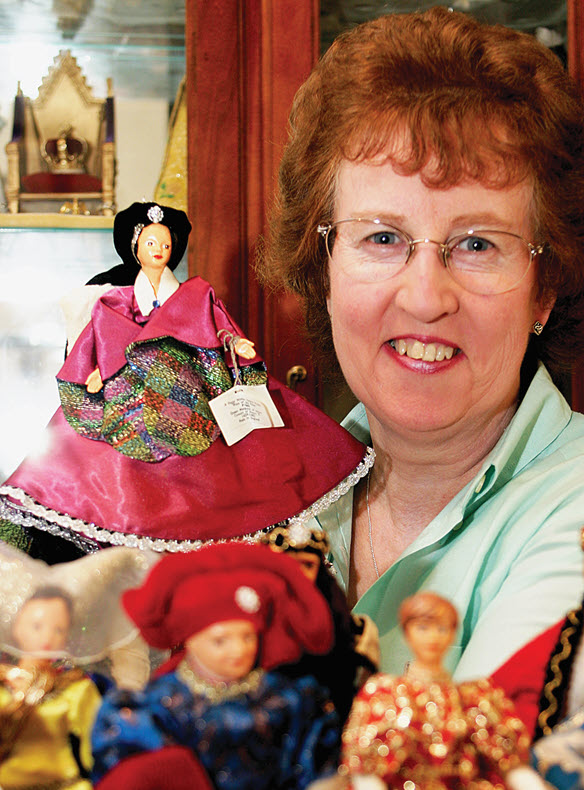 Chris Poulten posing with a doll at a June 2005 exhibition.