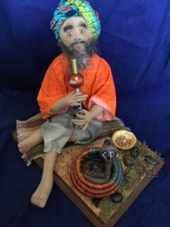 How the Flute Woos the Snake, 8 inches (seated)