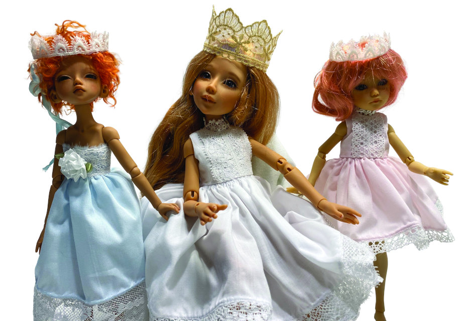 Rose Lacefield’s Jemima, Abrielle, and Winnie showcase Schmidt’s regal clothing styles.