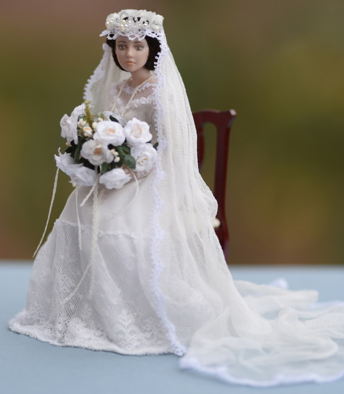 JoEllen is a 1:12 scale rendering of a bride; Maryina takes great pains to capture the emotions of her characters when sculpting their faces.