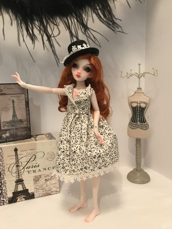 Pidgin looks elegant in her Schmidt garments. The Joshua McKenney doll features a special OOAK faceup.