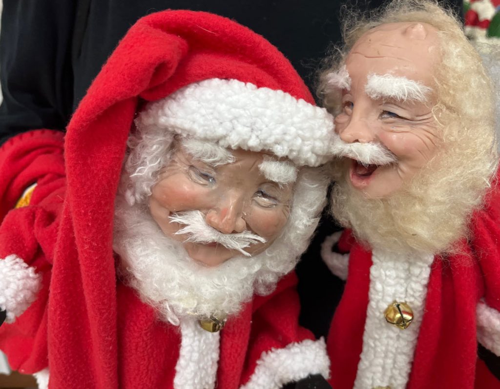 Santa dolls, one with hat and one without