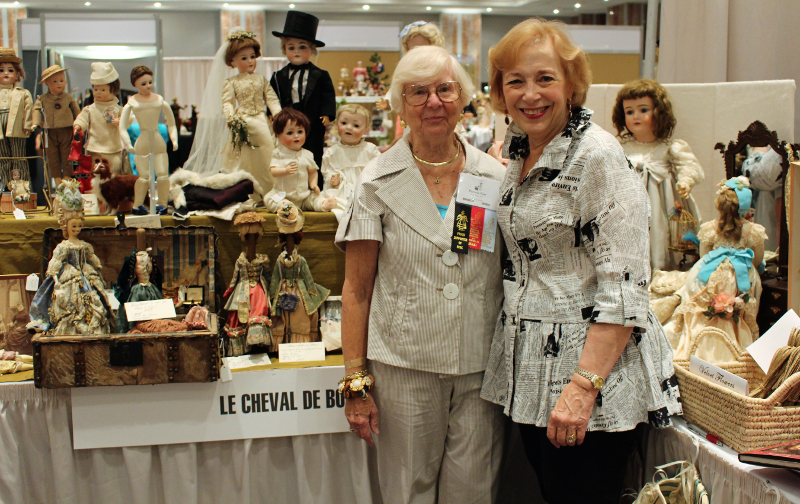 Pam Farr and Sheryl Williams pose in their booth at the 2017 annual UFDC convention.