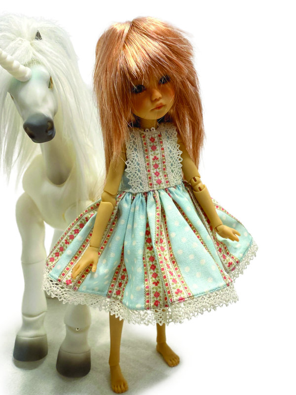 Rose Lacefield’s Winnie in a another adorable outfit by Schmidt.